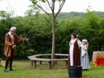 Lady MacDuff is shocked by the raspberry jam on dead Duncan's tee shirt
