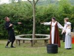 Lady MacDuff uses her invisible tazer on Murderer 1