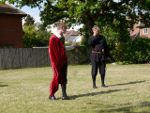 Ross is not convinced by Lennox's scarlet onesie