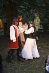Benedick and Beatrice demonstrate arm-wrestling