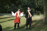 Benedick demonstrates invisible sword swallowing to Claudio