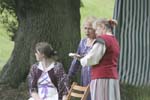 Hero watches the action, while Ursula and Margaret look at some tapestry - or is it the script