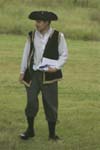 The Sexton clutches his Elizabethan laptop
