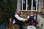 The musos have a chuckle looking at a music stand - odd bunch...