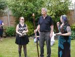 The Ariels admire Prospero's big staff