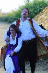 Kate about to give Petruchio and elbow below the belt
