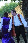 Petruchio fondles Kate's assets
