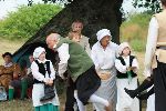 The servants take a kicking from Petruchio
