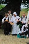 Servants laden down with appetizing looking food