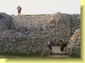 Parolles on the battlements, unaware he is observed