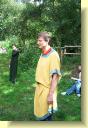 Cymbeline waits to make an entrance while Imogen and Pisania (seated) wonder what's going on.