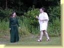 Iachimo tells Imogen what a bad boy Posthumus has been. Imogen doesn't seem to believe a word of it.