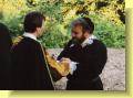 Antonio agrees his bond with Shylock (right)