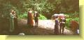 Bassanio learns of Antonio's plight, while the inhabitants of Belmont look on
