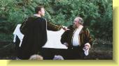 Mercutio (left) jokes with Benvolio