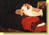 Romeo carries Juliet to her wedding bed
