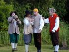 Four of the countrymen - and the jug of ale.