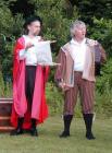 The Schoolmaster and Taborer keep a close eye on the dance.