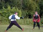 Palamon launches an attack on Arcite.